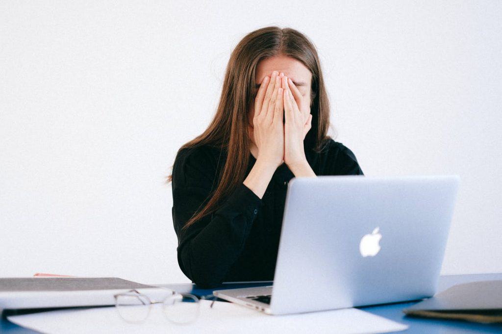 woman stressed out at her computer